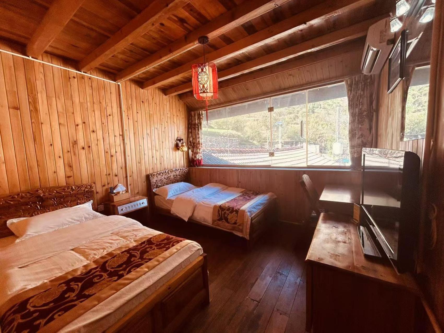 Tiger Leaping Gorge Sean'S Spring Guesthouse شانغريلا المظهر الخارجي الصورة